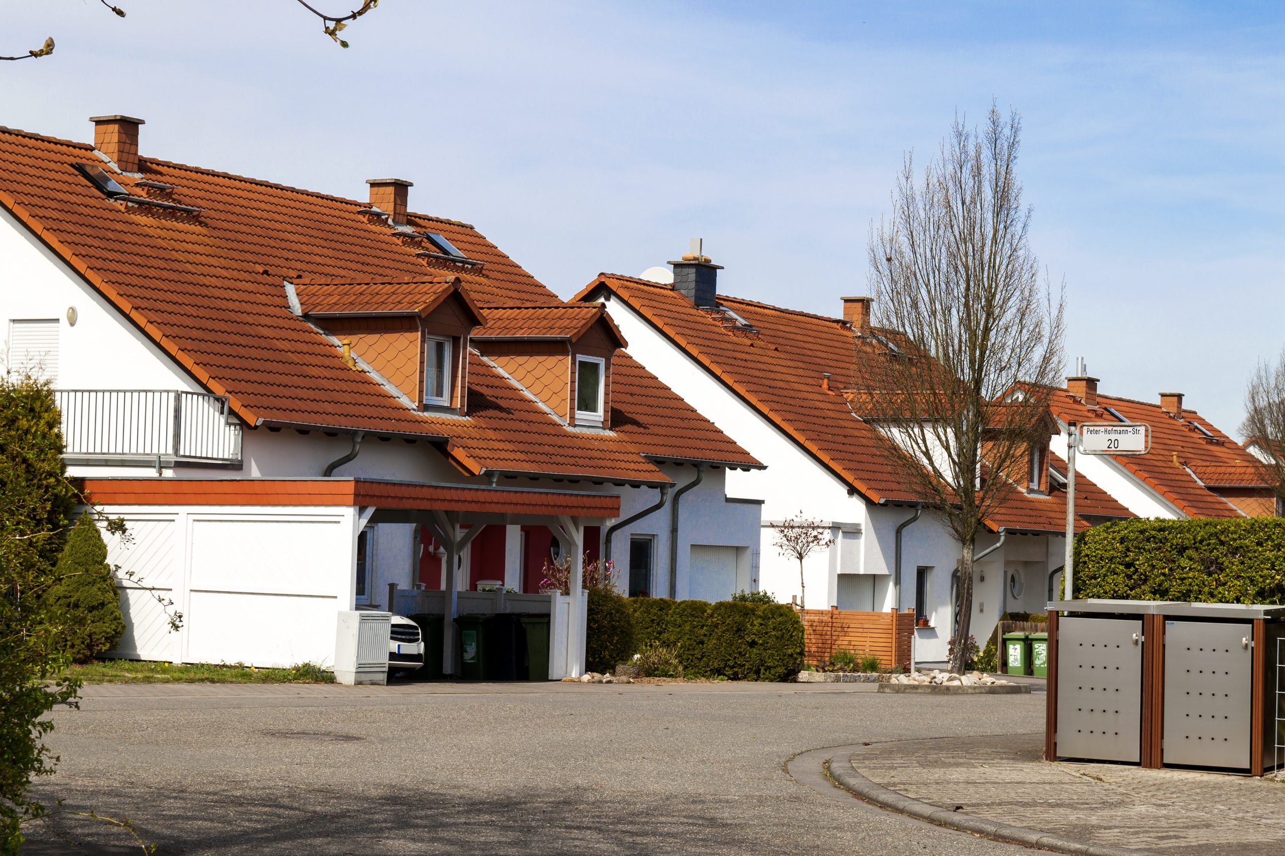 roofing style, a classic residential home with timeless orange tiles and roofing
