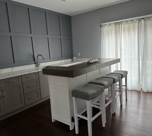 1 Modern Glen Cove bar with sleek finishes installed by a kitchen remodeling contractor